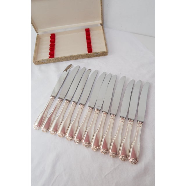 Measurements: 21 cm (spoons and forks), 14 cm (teaspoons), 25 cm and 93 grams (knives), 32.5 cm ladle. Silver plated,...