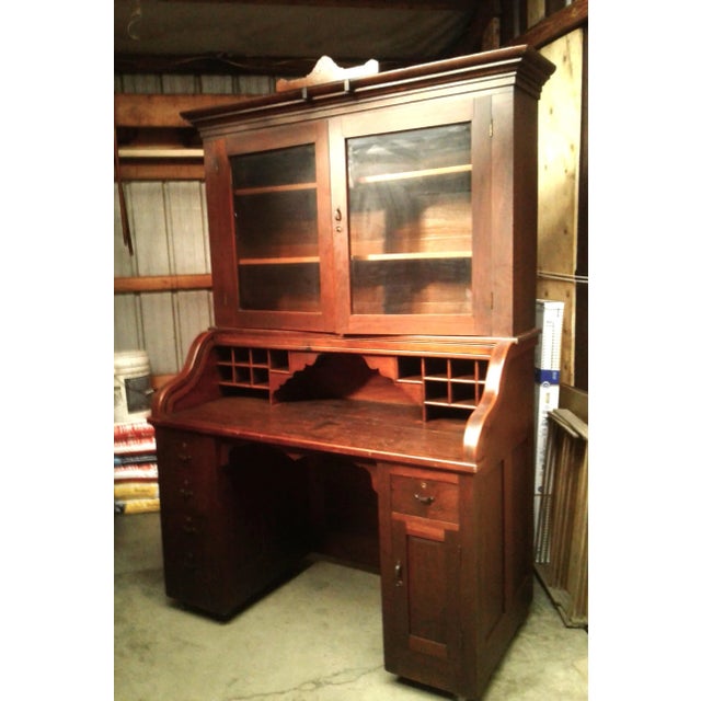 Antique 2 Piece Walnut S Curve Roll Top Desk w Bookcase Top Secret Compartment 1920s An antique high end hand crafted...