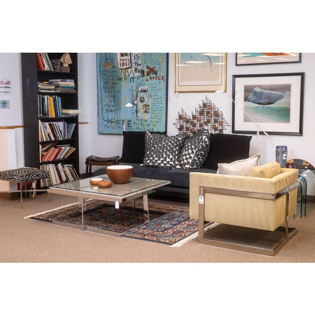 A vintage Milo Baughman chrome and travertine coffee table. This is a beautiful 70s coffee table with a fantastic Milo...