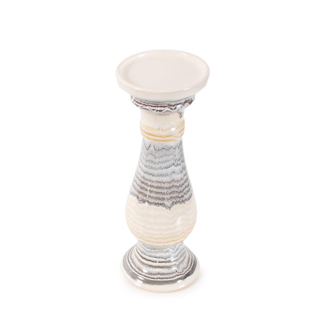 Featuring soft, layered bands of taupe, sand, and stone-gray tones, this ceramic piece captures the subtle beauty of...
