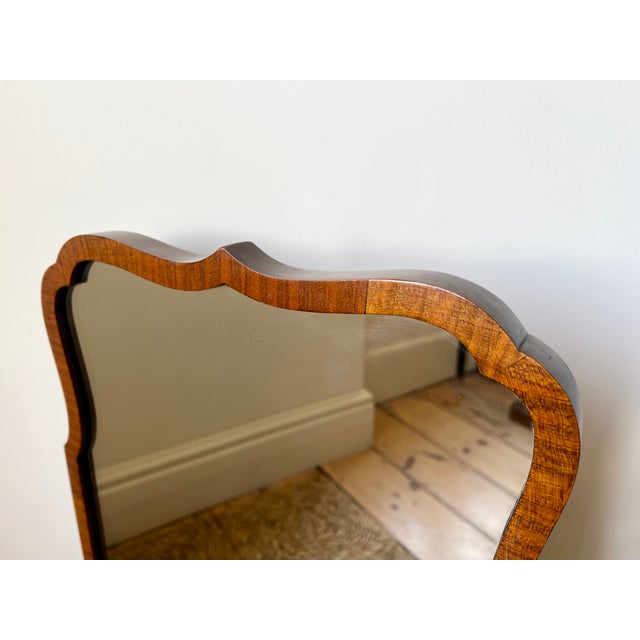 Antique Edwardian era mirror with a lovely scallop edge curved wood frame, English circa 1920 - 30. A quality mirror, well...
