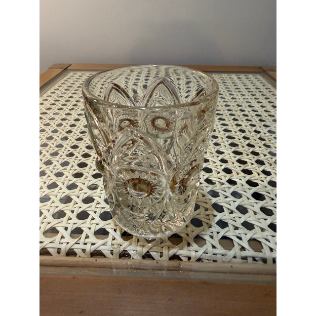 Pressed glass was a significant innovation in glassmaking during the 19th century, allowing for the mass production of...