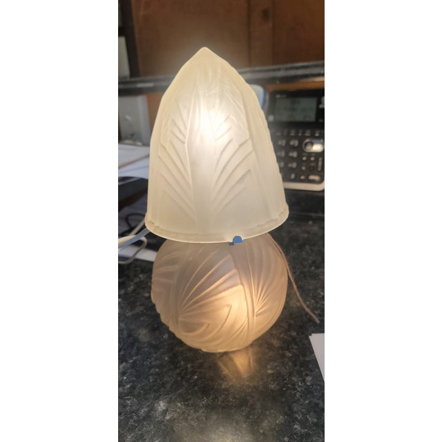 A wonderful Art Glass French lamp. Two lights one in base one in top. has been rewired for 110. Has slide switch for on...