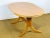 Vintage oval dining room table dating from the sixties composed of a butterfly extension. nice base. dimensions: h74 l160...