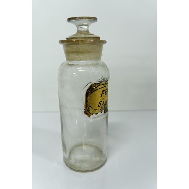 A late 19th century 1862 antique glass apothecary pharmacy jar labeled "Fear. Sulphur". Marked on the bottom with date and...