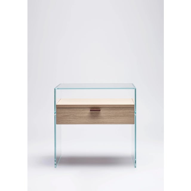 This nightstand comes from the Collection ZEN.A bedside table in extra clear tempered glass frame. It is available in...