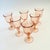 A set of 6 vintage wine glasses in a pale blush pink hue. Each glass has a lovely swirl design. Made in France by Arcoroc....