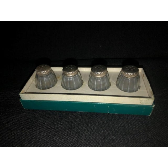 This Set comprises 4 salt and pepper cellars from Crystal & French .950 Silver (argent massif 950/000), finer than...