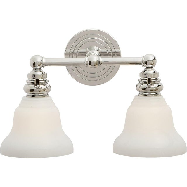Boston Functional Double Light in Polished Nickel with White Glass Designer: Chapman & Myers Height: 9" Extension: 9.5"...