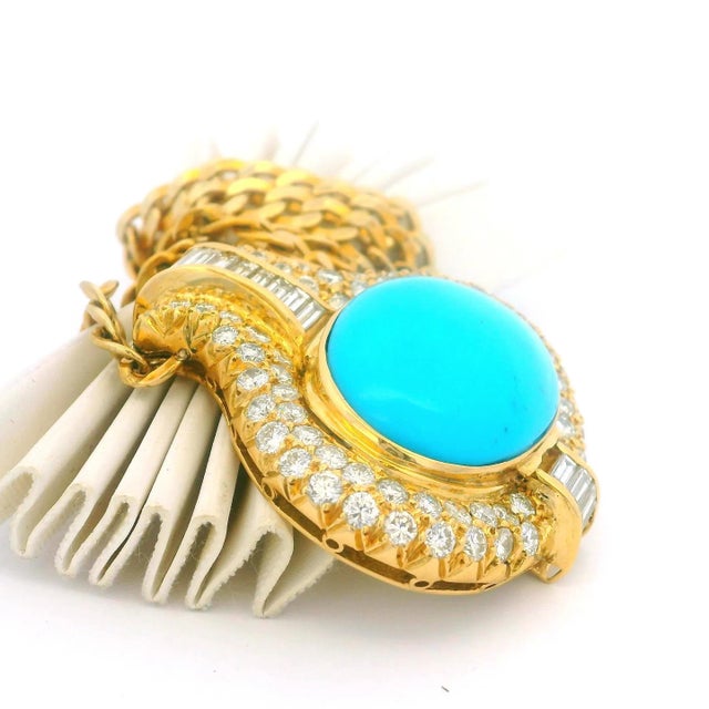 A glamorous Italian necklace from the late 1970s–80s, likely crafted by a Valenza atelier. Designed in 18K yellow gold, it...