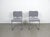 Set of two cantilever chairs with chrome-plated tubular steel frames and gray fabric upholstery from the 1970s. The...
