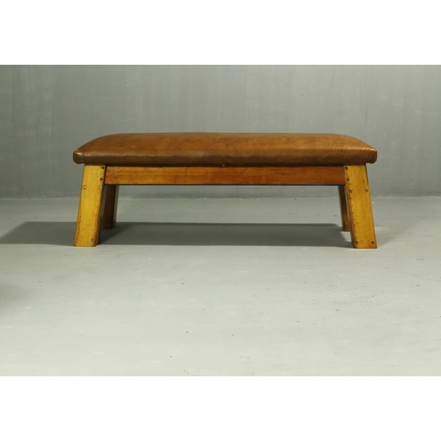 Leather gymnastics bench from the 1950s, made of cowhide in very good condition. Beautiful patina.
