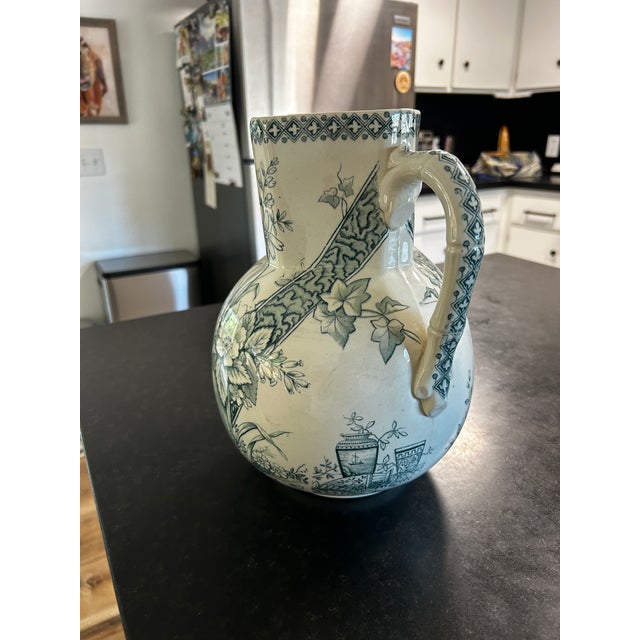 Antique Turner & Sons, Benedict, transferware, large pitcher. Teal and white.. Pitcher is 11 inches tall. Circa 1850-1880....