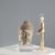 Stone sculpture depicting the head of Buddha with a acrylic glass support. This piece is attributed to the mentioned...