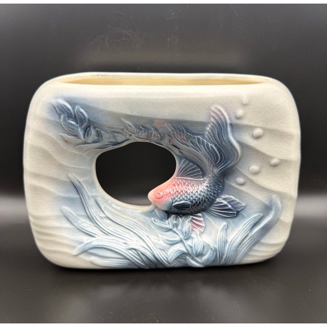 Charming vintage Royal Copley ceramic planter featuring a beautifully modeled koi fish swimming among stylized aquatic...
