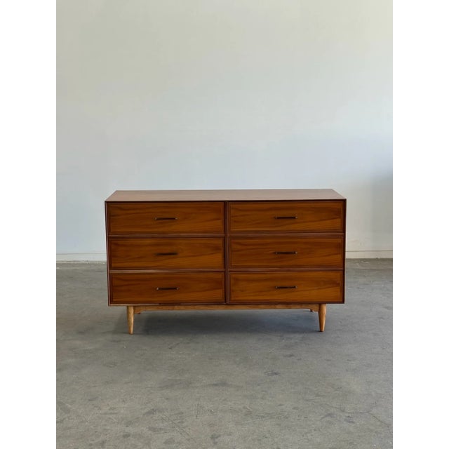 W56.25 D19 H33 Vintage dresser restored structurally and aesthetically with minimal design and subtle details. Item...