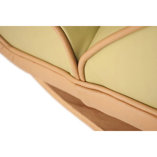 A striking British Mid-Century Modern chaise lounge by Andrew J. Milne, dating to circa 1950 and distinguished by its...