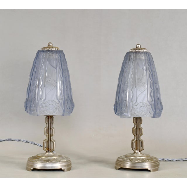 Donna Paris A pair of French art deco lamps made circa 1925-1935 by les établissements Donna. The nickel-plated bronze or...