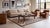 Elevate your space with this striking contemporary wool rug, featuring classic Southwestern and Navajo-inspired geometric...