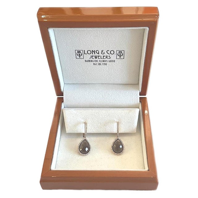 These earring are beautiful in person. Purchased at an upscale jewelry store & never worn. 14K rose gold with diamonds...