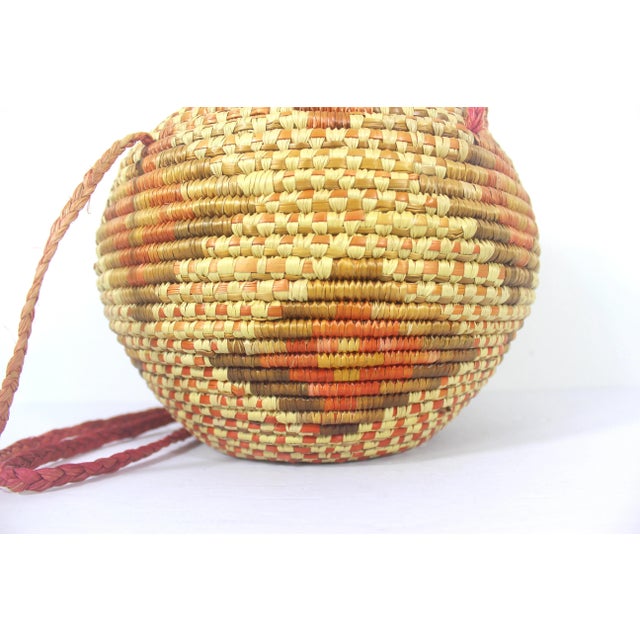 Vintage African Coiled Straw Lidded Two Tone Orange Hand Woven Covered Basket With Straps For Sale - Image 6 of 10