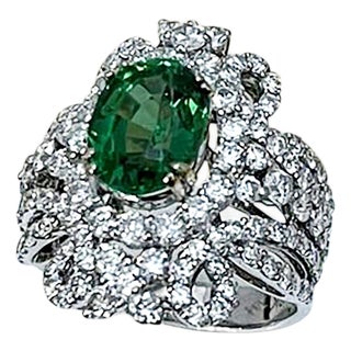 4 Carat Oval Tsavorite & 2.9 Carat Diamond in 18 Karat White Gold Ring Estate For Sale