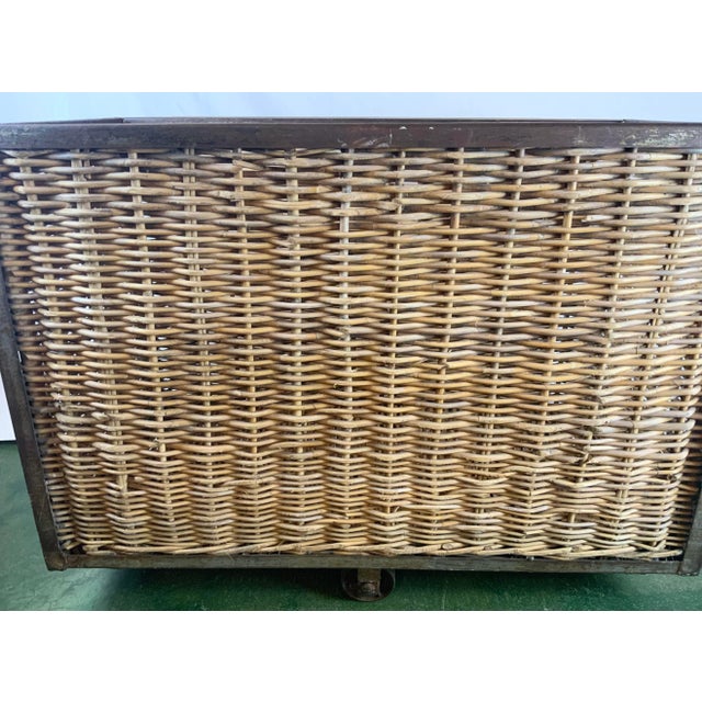 This beautiful French wicker rolling cart was skillfully woven from pencil reed rattan. Used originally in a French...