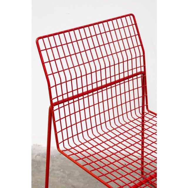 Set of four casamania iron chairs by frezza, 1980s-1990s. stackable and in good condition, with obvious signs of age but...