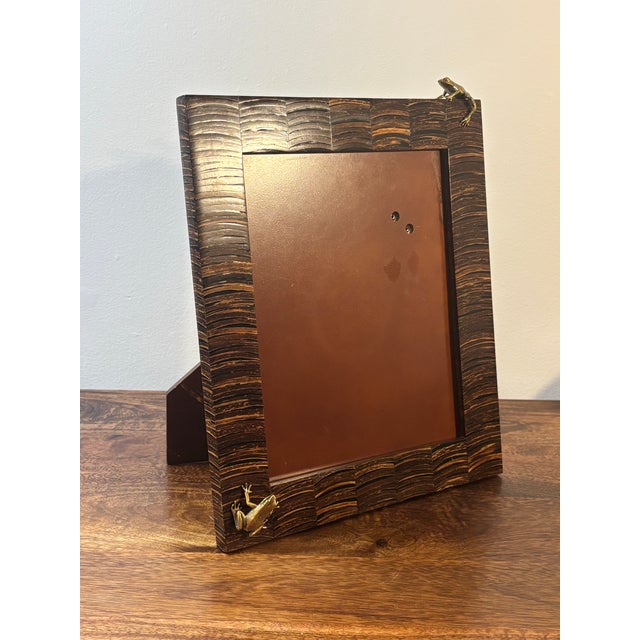 A striking vintage coastal picture frame clad entirely in hand-cut coconut shell tiles. Hundreds of individually cut shell...