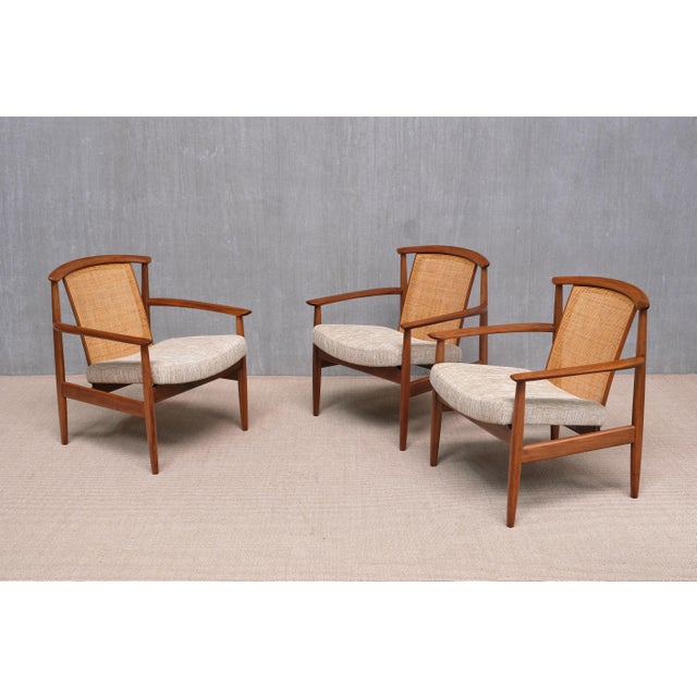 This rare set of three armchairs, model ‘Dallas’, was designed by Folke Ohlsson and produced by the Swedish manufacturer...