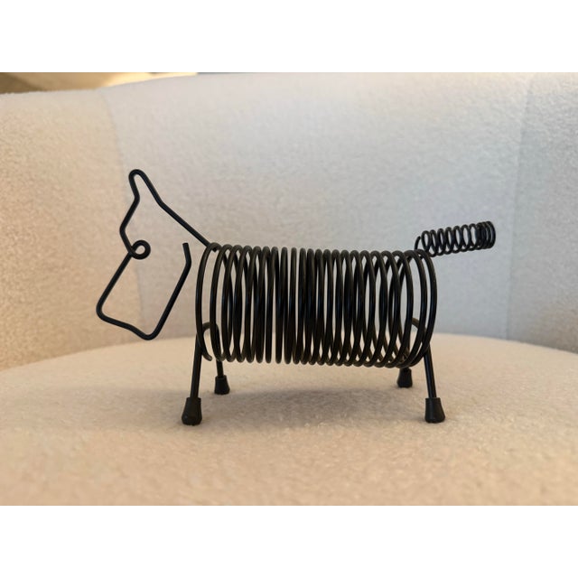 cute vintage atomic era wire dog pen holder / letter organizer . Circa '50s / '60s. The body and tail are constructed of...