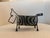 cute vintage atomic era wire dog pen holder / letter organizer . Circa '50s / '60s. The body and tail are constructed of...