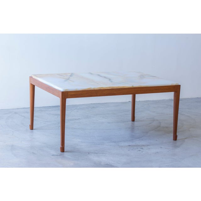 Sofa table by unknown designer and maker, Similar to the style of Josef Frank and Firma Svenskt Tenn. Solid teak base with...