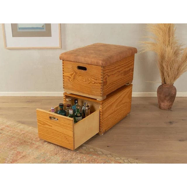 Unique bar cabinet consisting of two 1960s jump boxes. High quality body made of solid wood with pull -out bar compartment...