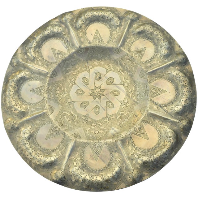 Antique highly crafted, engraved and detailed Moroccan brass tray with ornate multi-dimensional hand-engraved layers and...