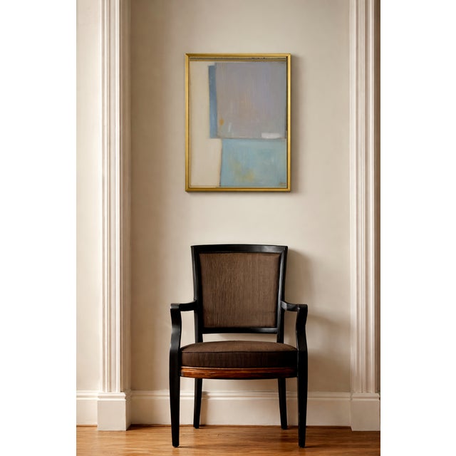 A serene contemporary abstract painting featuring layered geometric forms in soft blue, warm ivory, and muted gray. The...