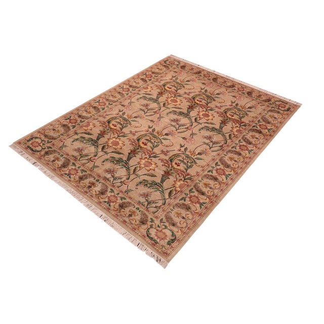 Designed with mesmerizing intricacy and gorgeous color palette, this hand-knotted masterpiece demonstrates the beauty and...