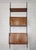 Large and highly elegant 13 piece Italian modular wall unit dating from the 1960s, executed in warm teak veneered wood...