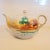 Lovely vintage teapot with handpainted trees and huts. Gold trim on spout, handle and rim. In very good condition...