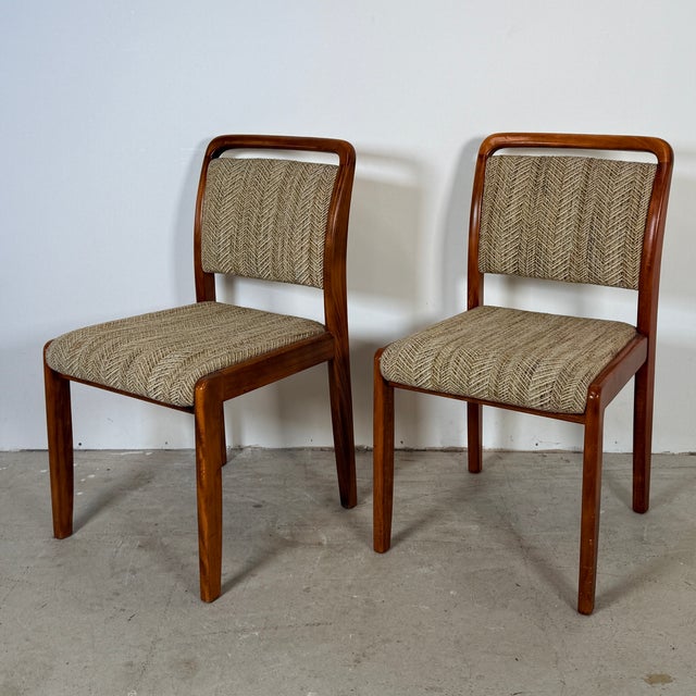 This stylish and comfortable set of dining chairs features herringbone upholstery. Although their origins are unknown,...