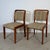 This stylish and comfortable set of dining chairs features herringbone upholstery. Although their origins are unknown,...