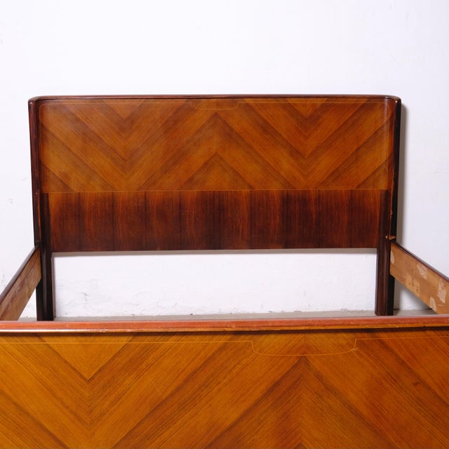 Double bed frame, original design and production from the 1950s. Wooden frame with elegant, clean lines, distinctive...