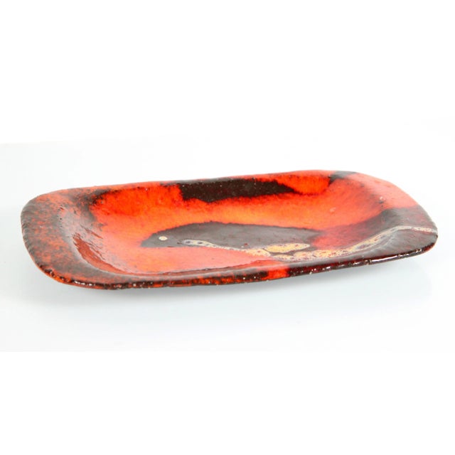 Beautiful vintage mid century modern deep red orange lava glazed pottery dish! Great color with deep reds and oranges and...