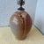This vintage handmade studio pottery lamp features a lava drip design. The softly textured surface and balanced form give...