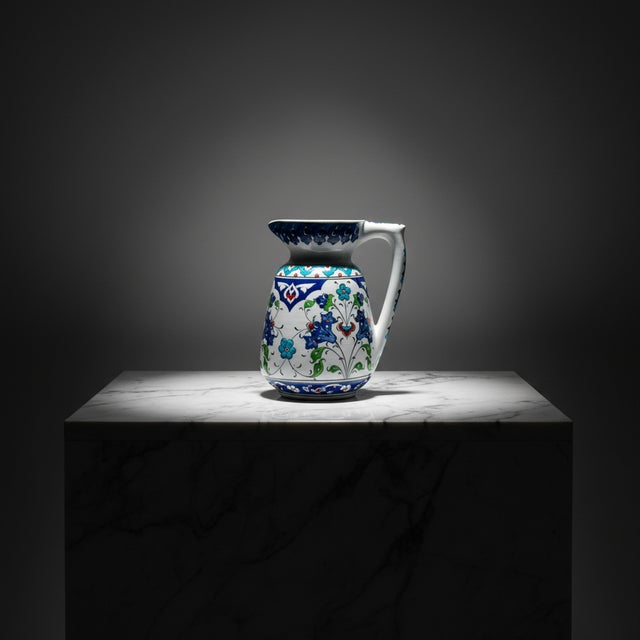 The Garden Window This Handmade Ceramic Pitcher brings the joy of a blooming garden into your home. Standing at 20 cm, it...