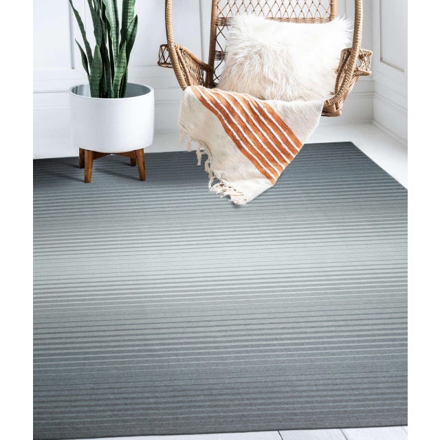 Timeless Comfortable Gray Flatweave Wool Rug, Country of Origin: India. This exceptional flatweave piece, characterized by...