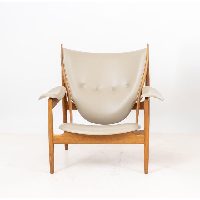 Finn Juhl (Danish, 1912-1989) "Chieftain" Lounge Chair, walnut frame and tan leather upholstery, with "One Collection /...