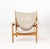Finn Juhl (Danish, 1912-1989) "Chieftain" Lounge Chair, walnut frame and tan leather upholstery, with "One Collection /...