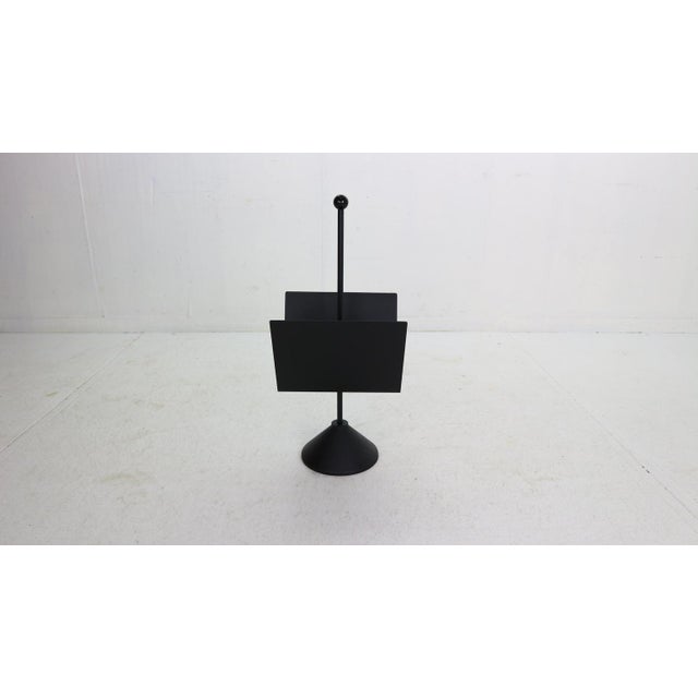 Post-modern period, minimalistic design magazine rack designed by Porada Arredi in 1980's, Italy. Black metal magazine...