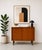 Danish Mid Century Modern Teak Jr. Credenza / Storage Cabinet, c. 1960's. This piece is highlighted by some incredible...
